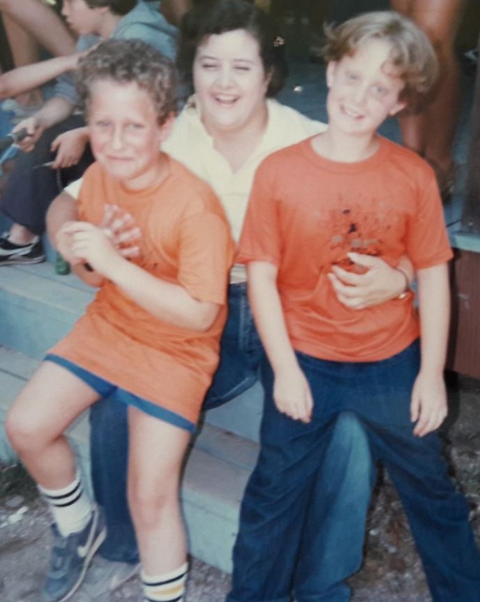 Issokson at summer camp with sister and friend.